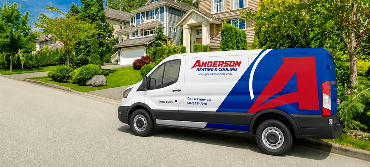 Anderson Heating and Cooling service van parked on a residential street